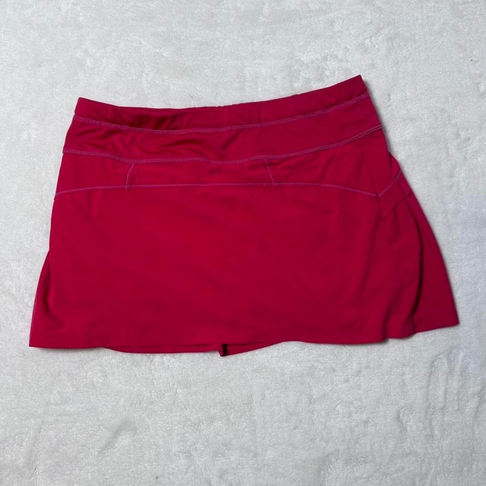 Athleta pink tennis skirt with built-in shorts and‎ pockets. Size: S #tennis